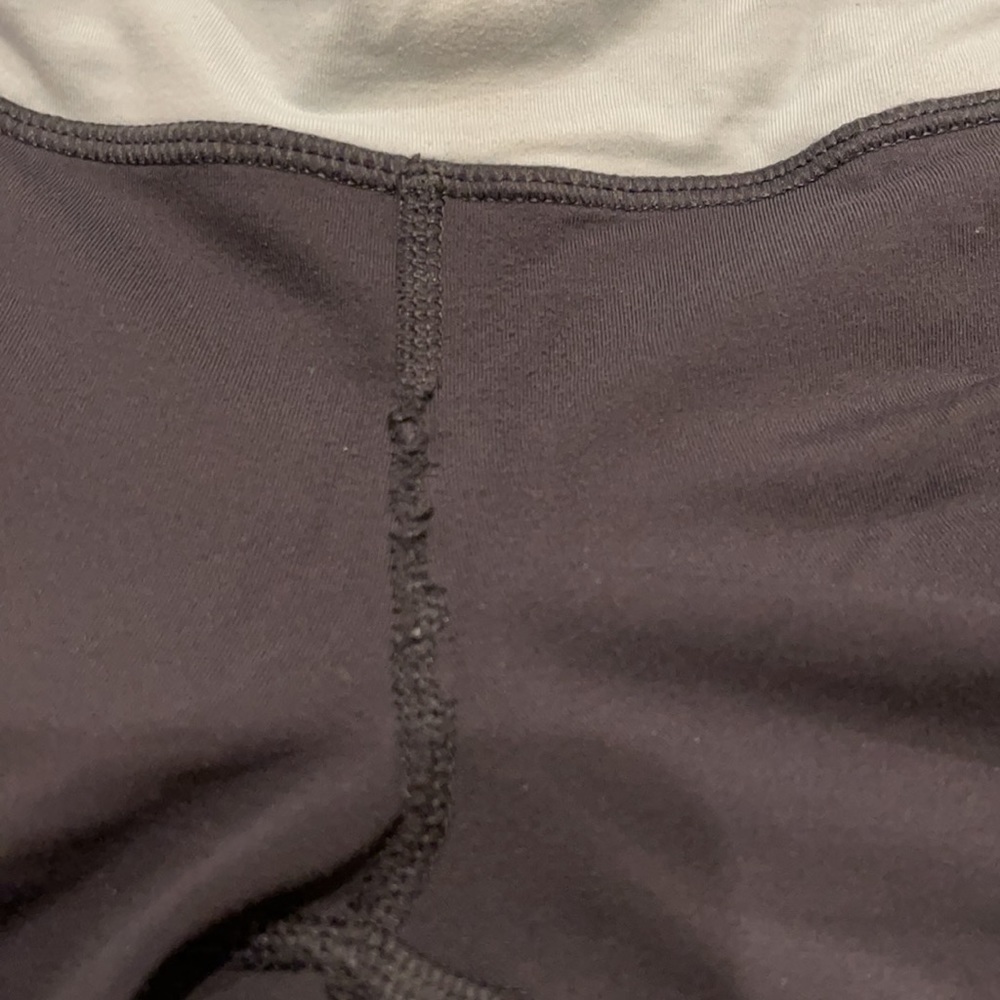B: 𝅺Lululemon Sz 6 Run Fast and Free Crop Leggings Black Teal ruffle accent - Picture 9 of 9